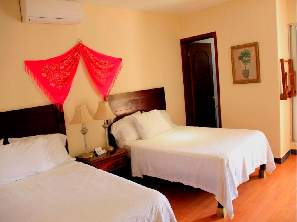 Postel nebo postele na pokoji v ubytování Hotel Zamna Boutique