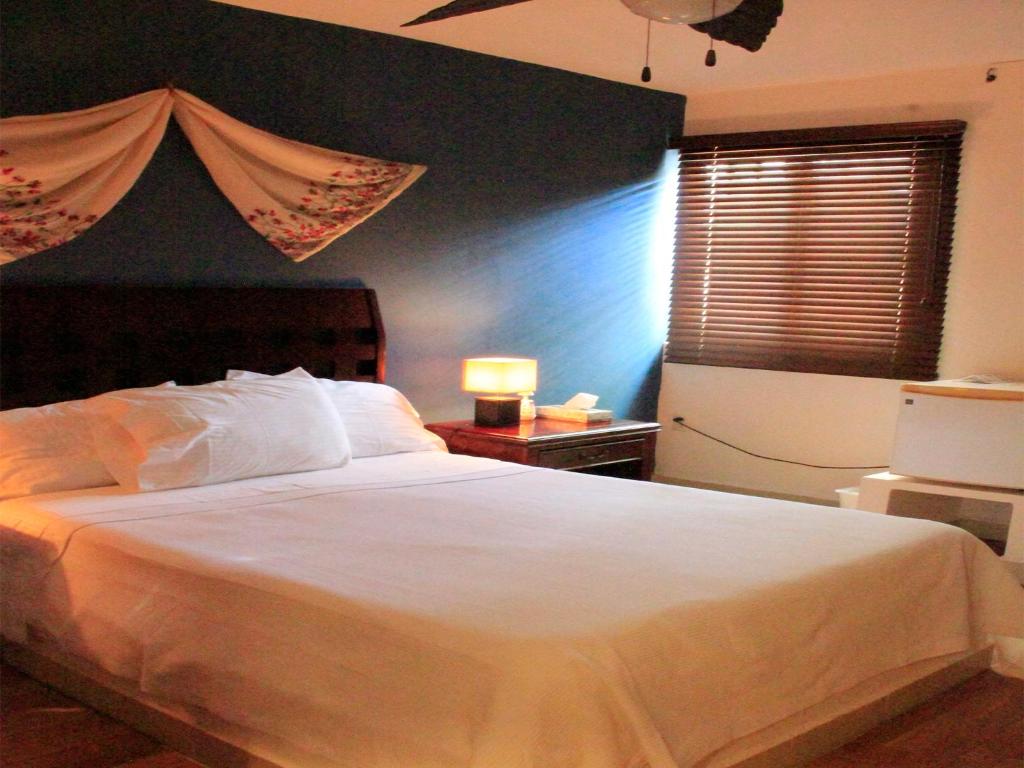 Postel nebo postele na pokoji v ubytování Hotel Zamna Boutique