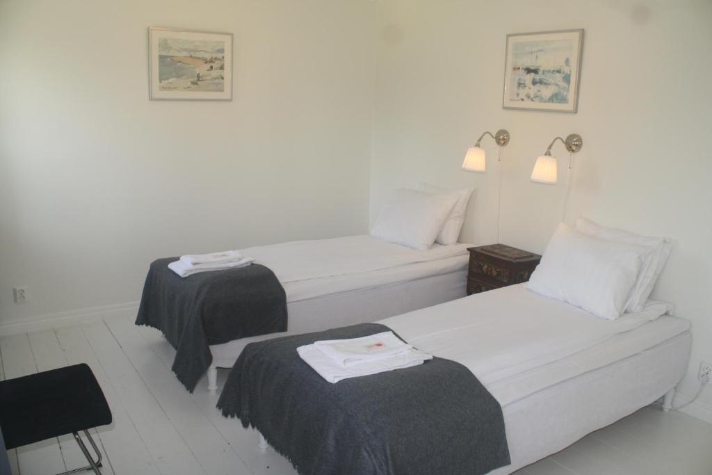 Postel nebo postele na pokoji v ubytování Alvaret Hotel & Hostel