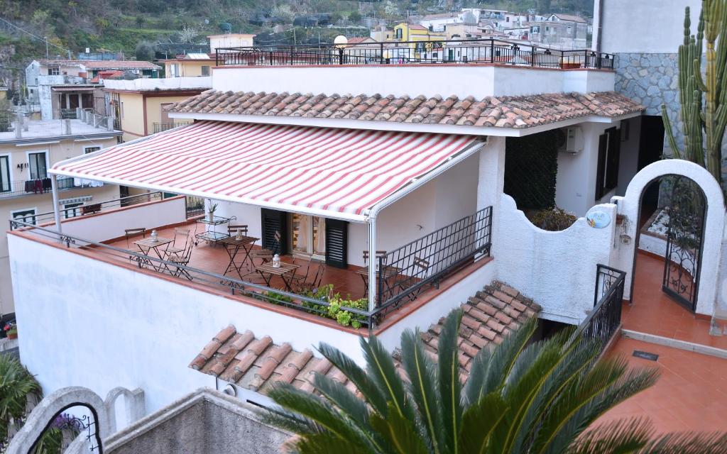 a white house with a red roof at B&B Cetara Amalfi Coast in Cetara