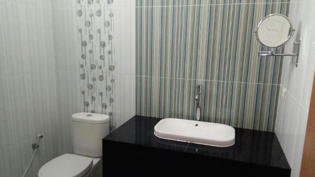 Koupelna v ubytování Nariska Suite Homestay Lampung