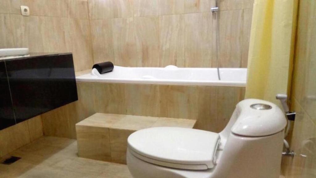 Koupelna v ubytování Nariska Suite Homestay Lampung