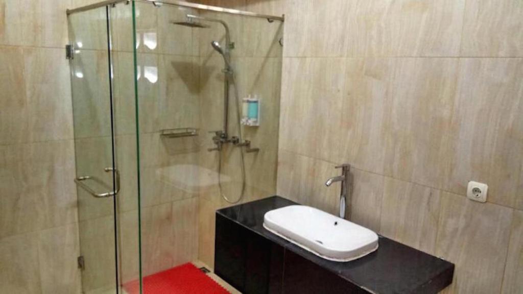 Koupelna v ubytování Nariska Suite Homestay Lampung