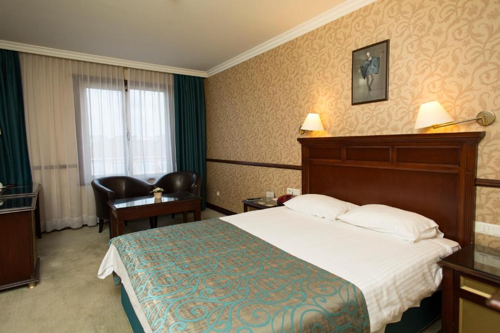 Posteľ alebo postele v izbe v ubytovaní Topkapi Inter Istanbul Hotel