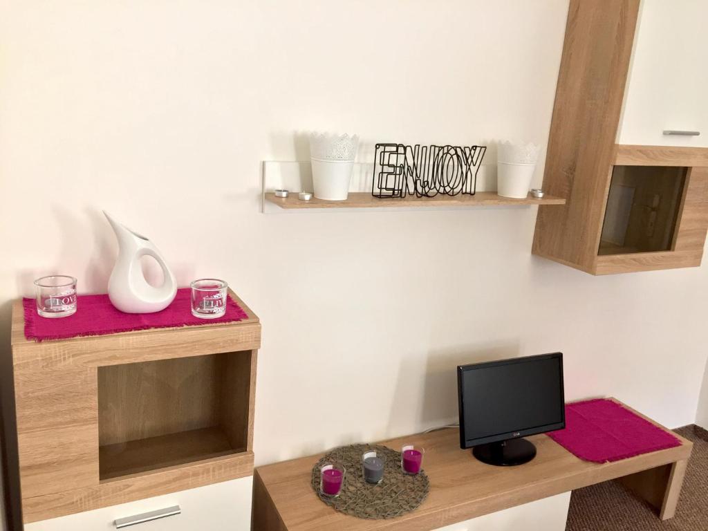 TV a/nebo společenská místnost v ubytování Apartment Olomouc Centre