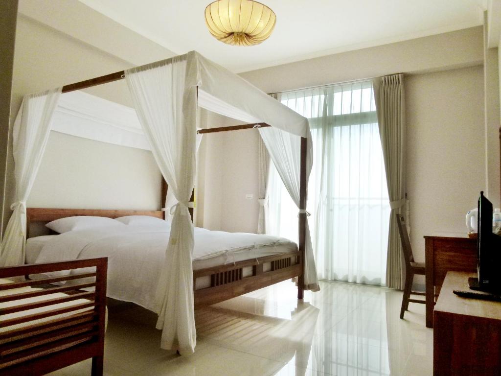 Voodi või voodid majutusasutuse 吉貝島民宿-德芬旅館Down Home Hotel toas