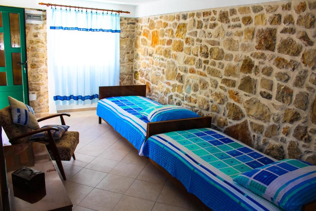 Katil atau katil-katil dalam bilik di Apartment Titinica