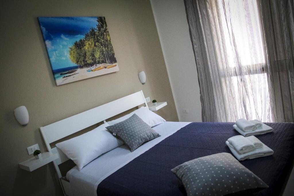 Postel nebo postele na pokoji v ubytování B&B Solarium