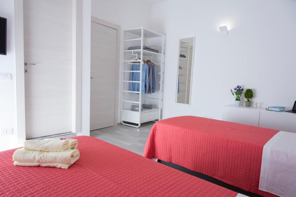 Posteľ alebo postele v izbe v ubytovaní Al Duomo B&B