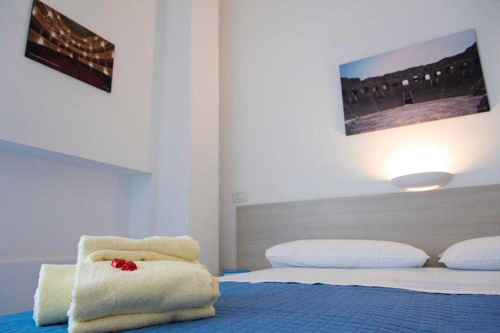 Posteľ alebo postele v izbe v ubytovaní Al Duomo B&B