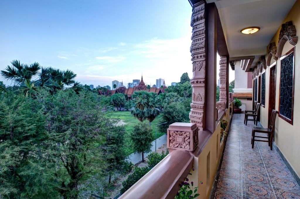 a balcony with a view of the city at RS II Guesthouse in Phnom Penh