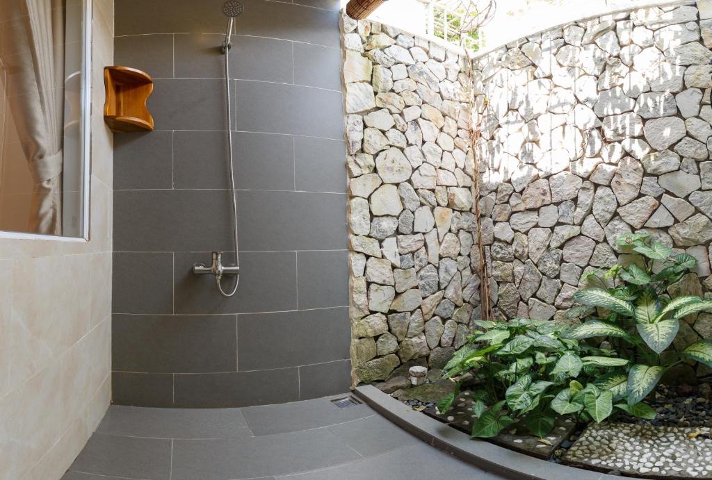 Koupelna v ubytování Miana Resort Phu Quoc