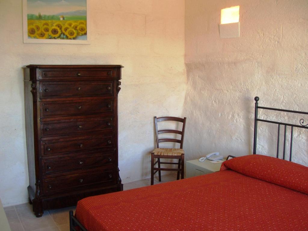 Postel nebo postele na pokoji v ubytování Masseria L'Antico Frantoio