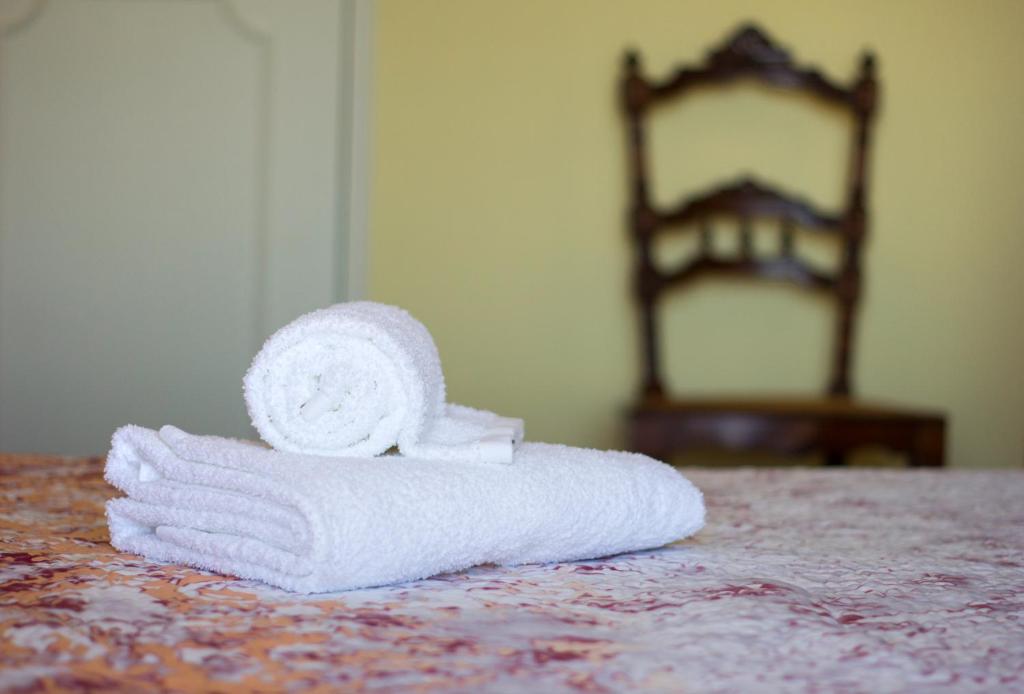 Postel nebo postele na pokoji v ubytování CASA BELAVISTA - BAÍA