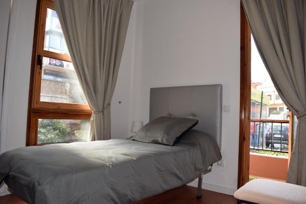 Postel nebo postele na pokoji v ubytování Apartamento San Isidro