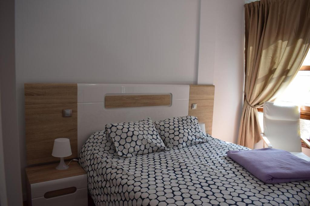 Postel nebo postele na pokoji v ubytování Apartamento San Isidro