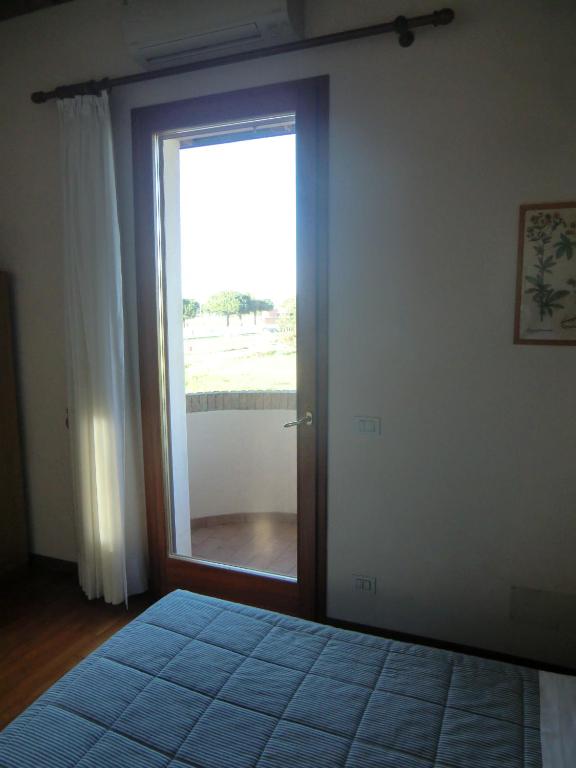 Postel nebo postele na pokoji v ubytování B&B Armonia