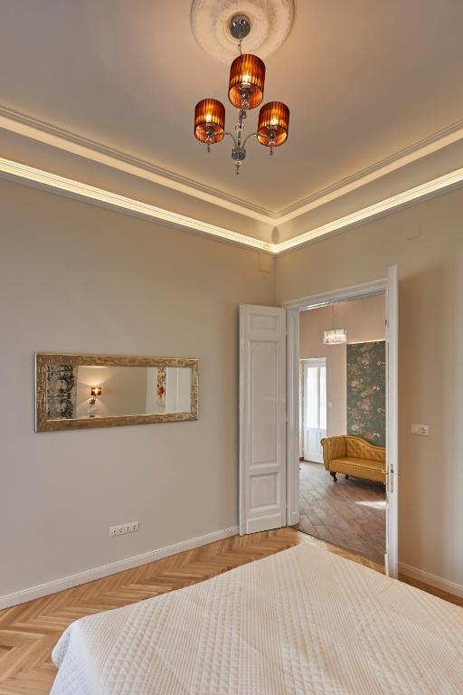 Posteľ alebo postele v izbe v ubytovaní Falk Miksa Apartment