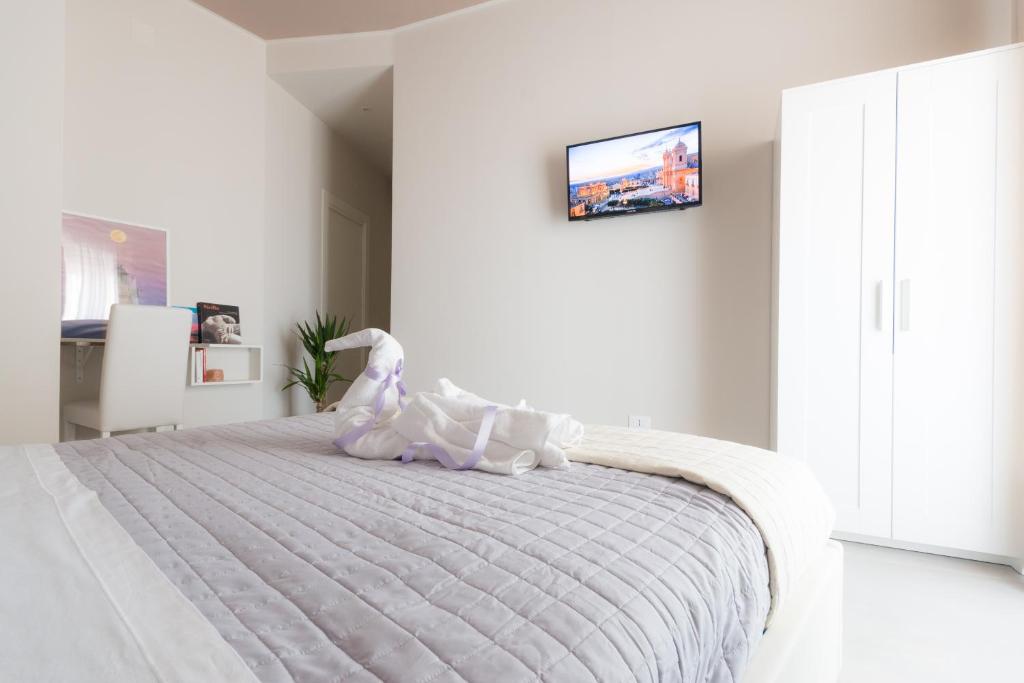 Postel nebo postele na pokoji v ubytování PhotoGuest B&B