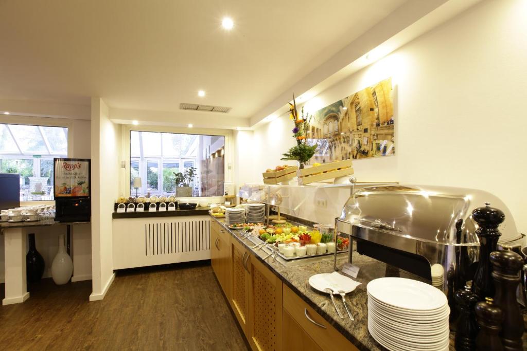 Kuchyň nebo kuchyňský kout v ubytování Arthotel ANA Eden