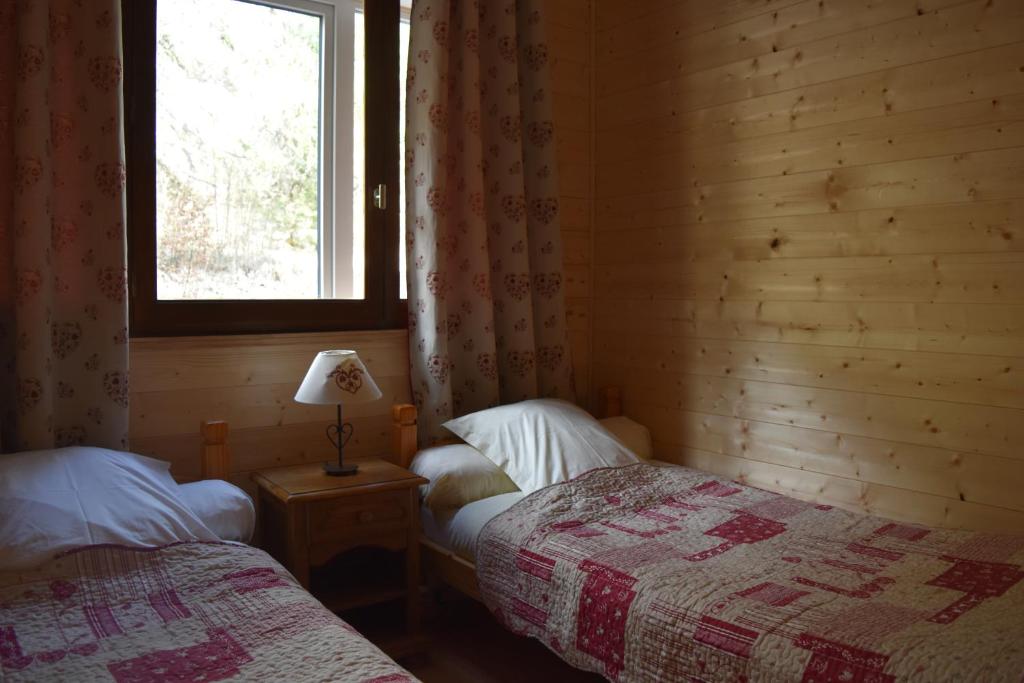 Letto o letti in una camera di Résidence Le Fontenay