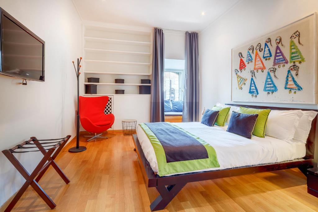 Cama ou camas em um quarto em HT N°9 Colosseo