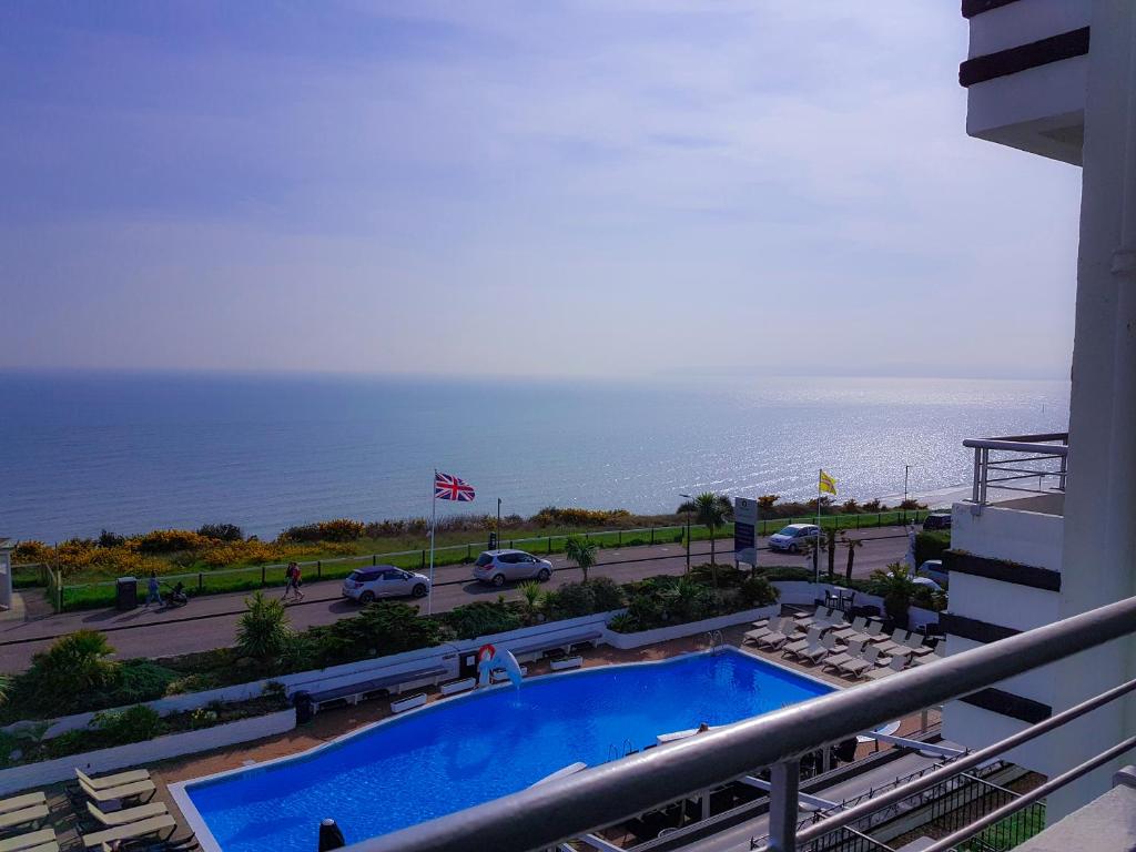 a view of the ocean from a hotel balcony at Cumberland Hotel - OCEANA COLLECTION in Bournemouth