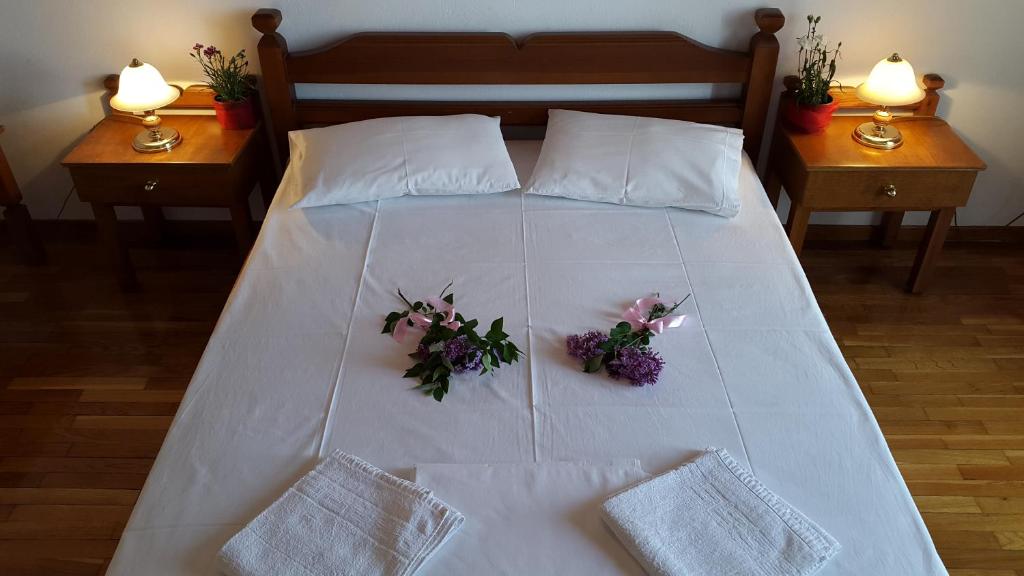 Postel nebo postele na pokoji v ubytování Epic Rooms