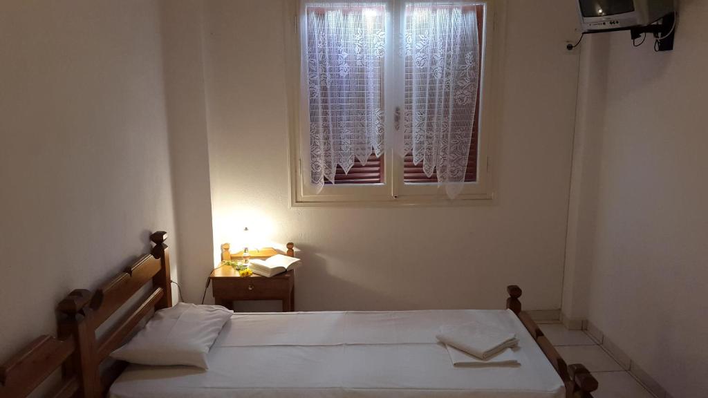 Postel nebo postele na pokoji v ubytování Epic Rooms
