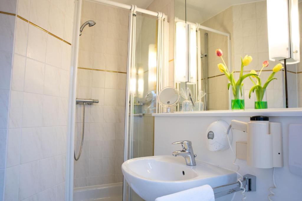 Koupelna v ubytování Hotel Schere