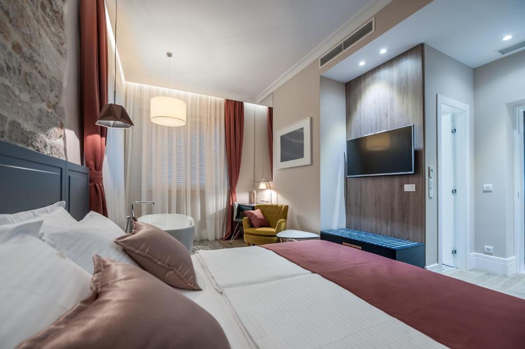 Postel nebo postele na pokoji v ubytování Zadera Accommodation