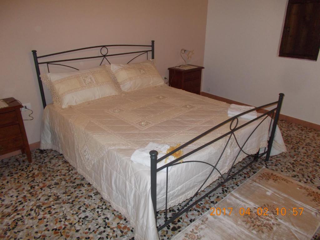 Postel nebo postele na pokoji v ubytování A Casa Di Monia