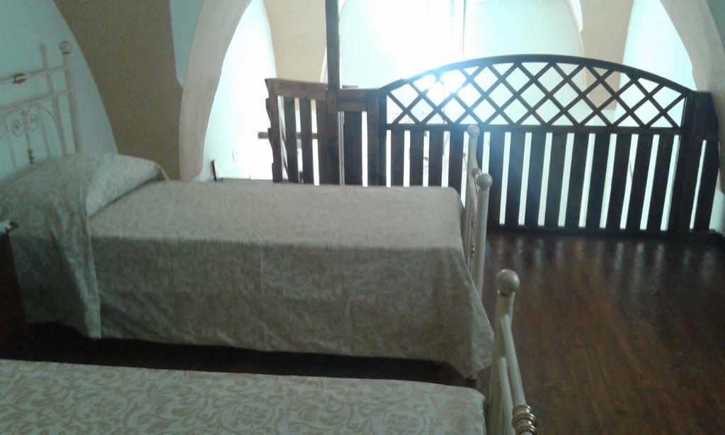 Postel nebo postele na pokoji v ubytování A Casa Di Monia