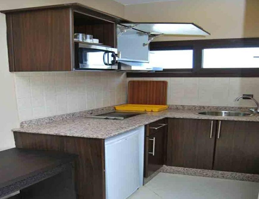 Kuchyň nebo kuchyňský kout v ubytování Suite Hotel Tilila