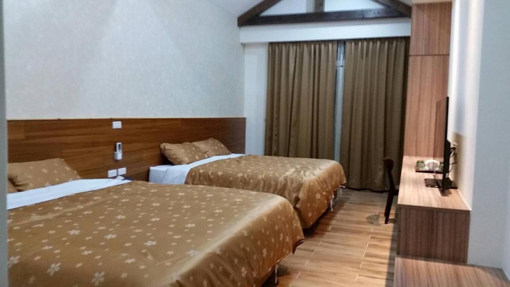 Letto o letti in una camera di 耘禾莊園民宿 台東縣民宿編號1273號