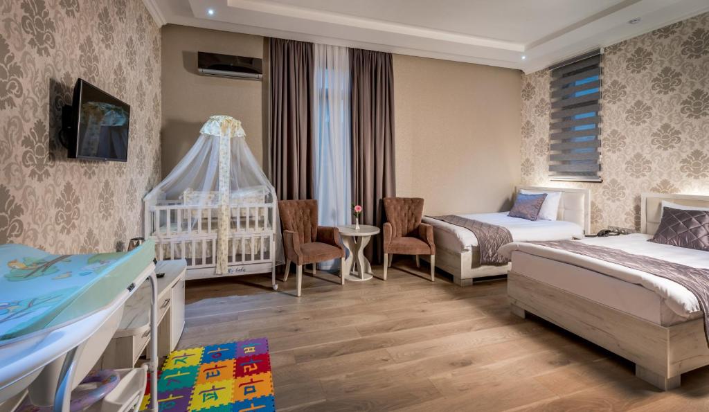 Aster Hotel Group - Superior Triple Room