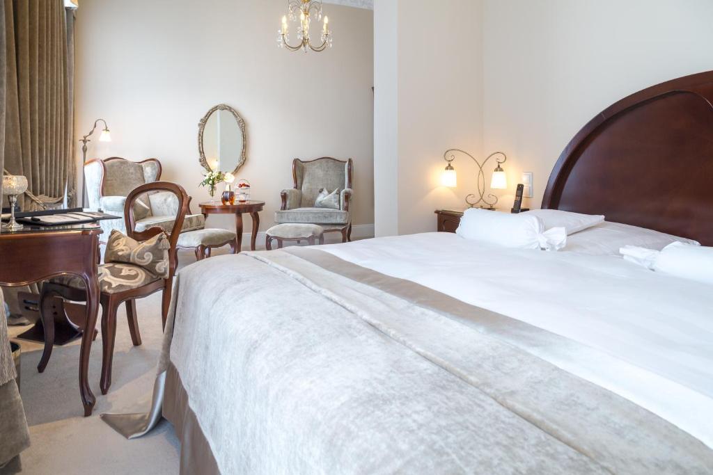 Postel nebo postele na pokoji v ubytování Hotel Miramar