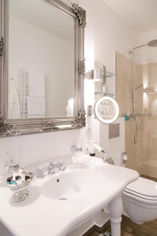 Koupelna v ubytování Hotel Miramar