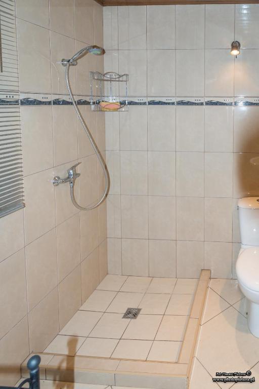 Koupelna v ubytování Domek letniskowy Sieraków