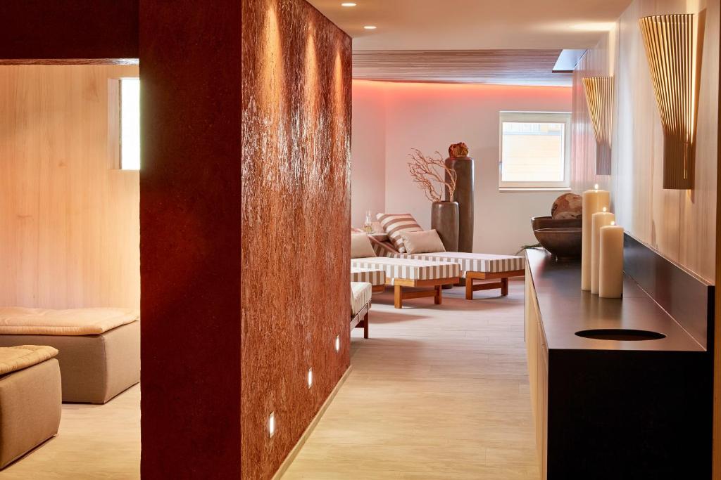 Postel nebo postele na pokoji v ubytování Hotel Konradin