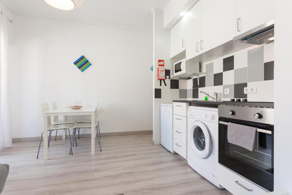 Kuchyň nebo kuchyňský kout v ubytování FLH Marquês Modern Flat