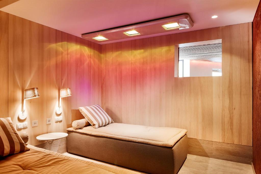 Postel nebo postele na pokoji v ubytování Hotel Konradin