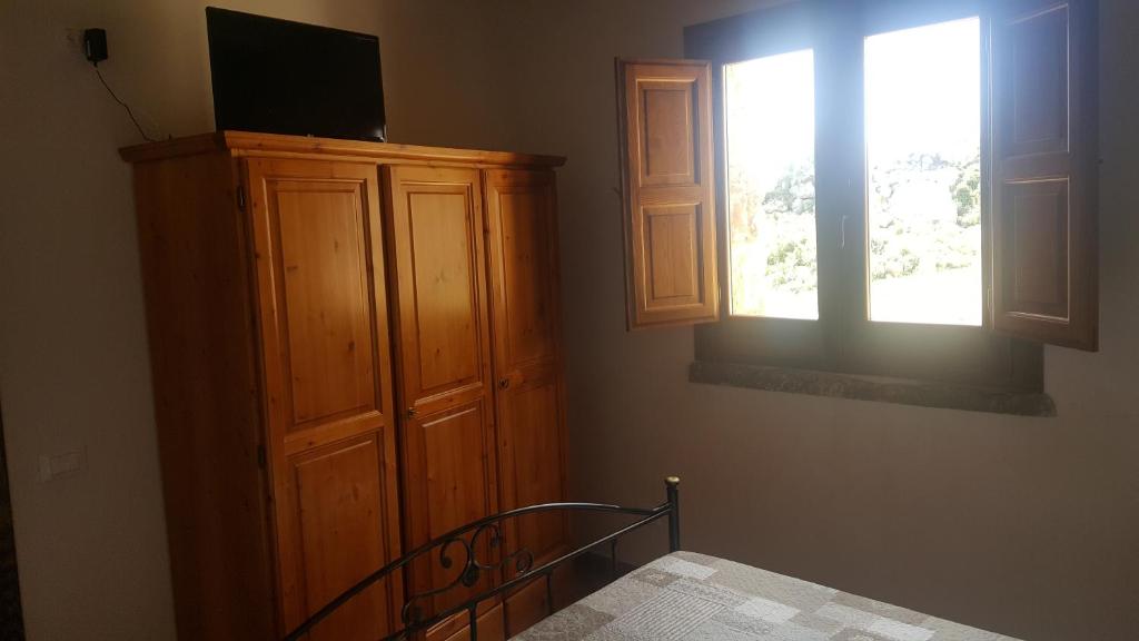Telewizja i/lub zestaw kina domowego w obiekcie Vecchio Baglio Cofano