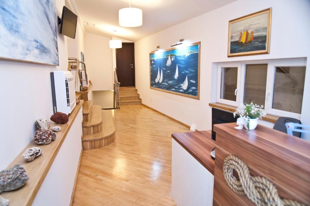 TV a/nebo společenská místnost v ubytování Palma Rooms B&B