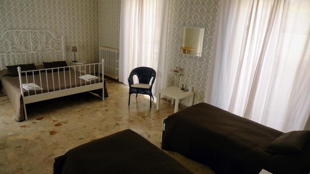Postel nebo postele na pokoji v ubytování I Tetti di Siciliando