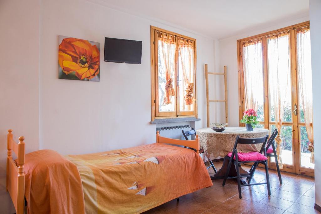 Postel nebo postele na pokoji v ubytování B&B La Gatta Blu