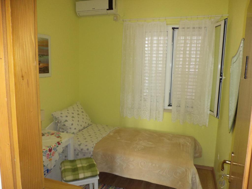 Posteľ alebo postele v izbe v ubytovaní Apartments & Rooms Abba