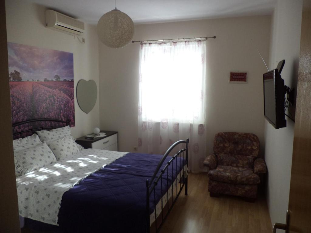 Posteľ alebo postele v izbe v ubytovaní Apartments & Rooms Abba