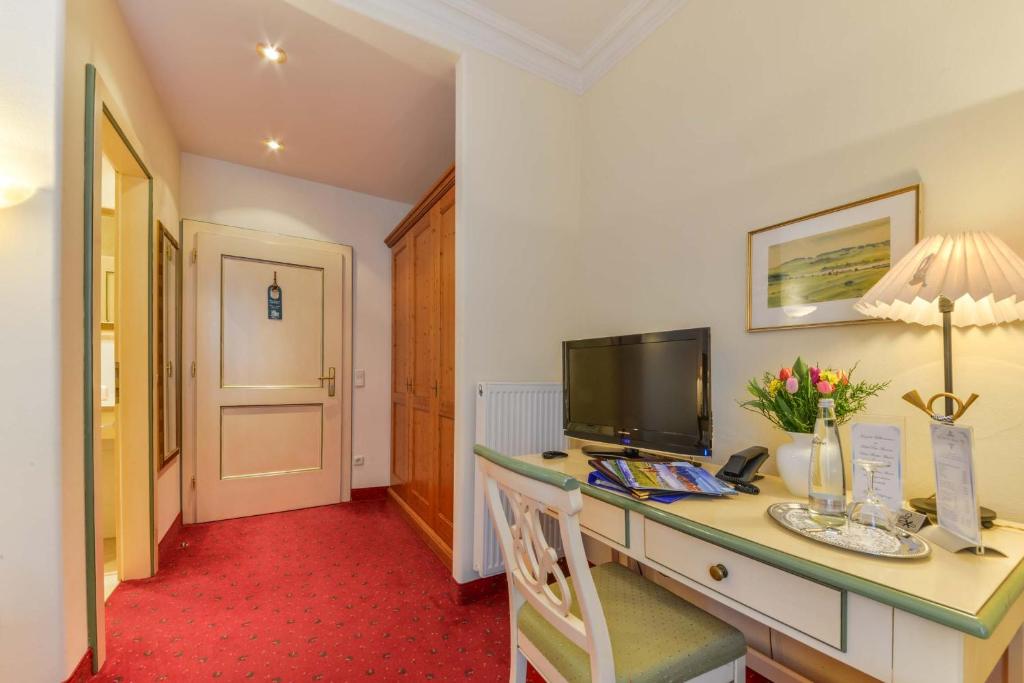 TV a/nebo společenská místnost v ubytování Hotel Post Murnau