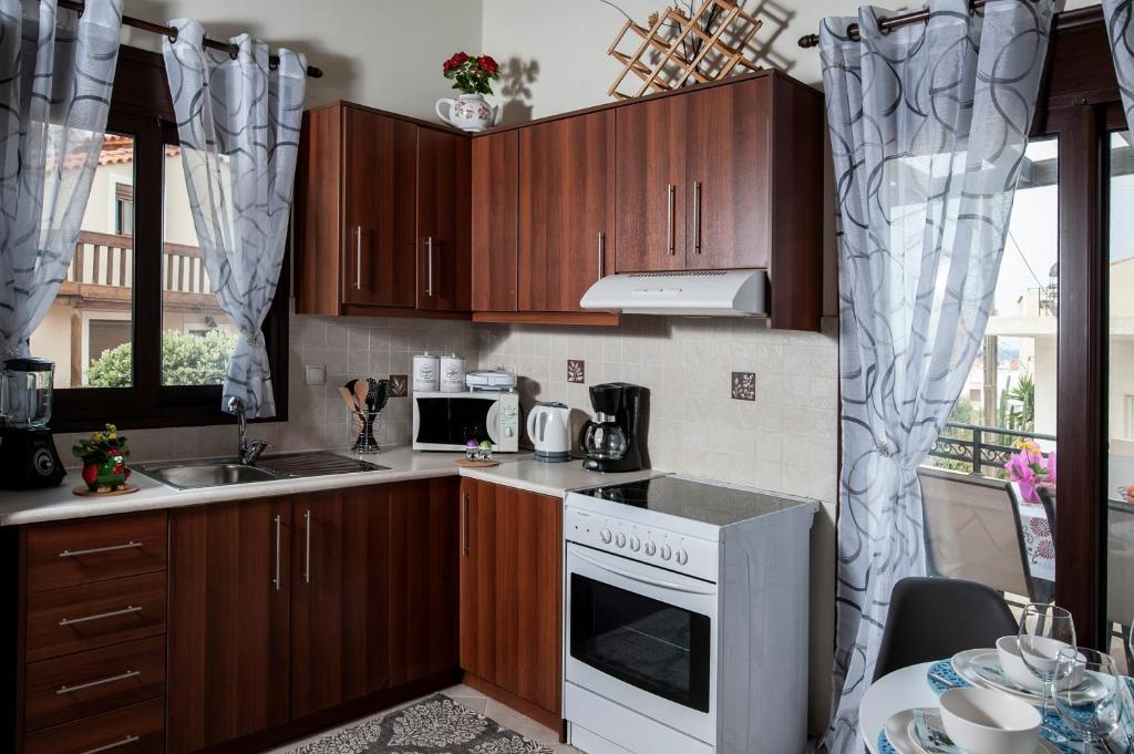 Kuchnia lub aneks kuchenny w obiekcie Kyriaki's Cozy Apartments